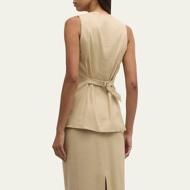 Veronica Beard "Liff" linen-blend suiting vest V neckline  Sleeveless Adjustable back belt  Hip welt pockets  Tailored fit Cut-away hem Button-front  Linen/viscose/elastane Lining: Polyester Dry clean Imported Sleeveless Linen Vest For Daywear, Tailored Sleeveless Summer Vest, Fitted Vest For Workwear In Summer, Summer Linen Vest For Workwear, Fitted Sleeveless Linen Vest, Spring Workwear Linen Vest, Classic Summer Vest For Business Casual, V-neck Linen Vest For Workwear, Classic Summer Vest For Office