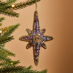 an ornament hanging from a christmas tree