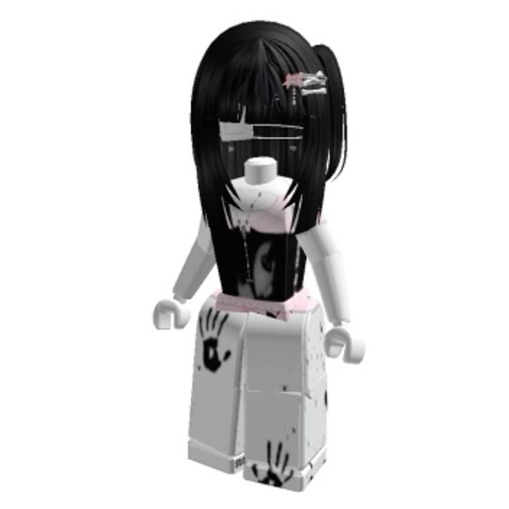 a white and black doll with long hair