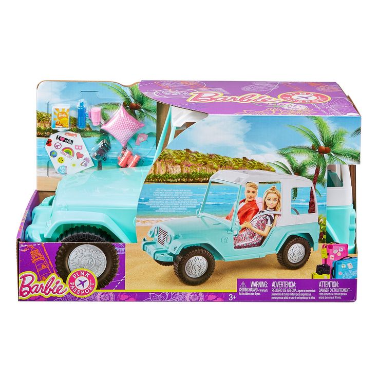 a blue toy truck with barbie on the back in a cardboard box next to a palm tree