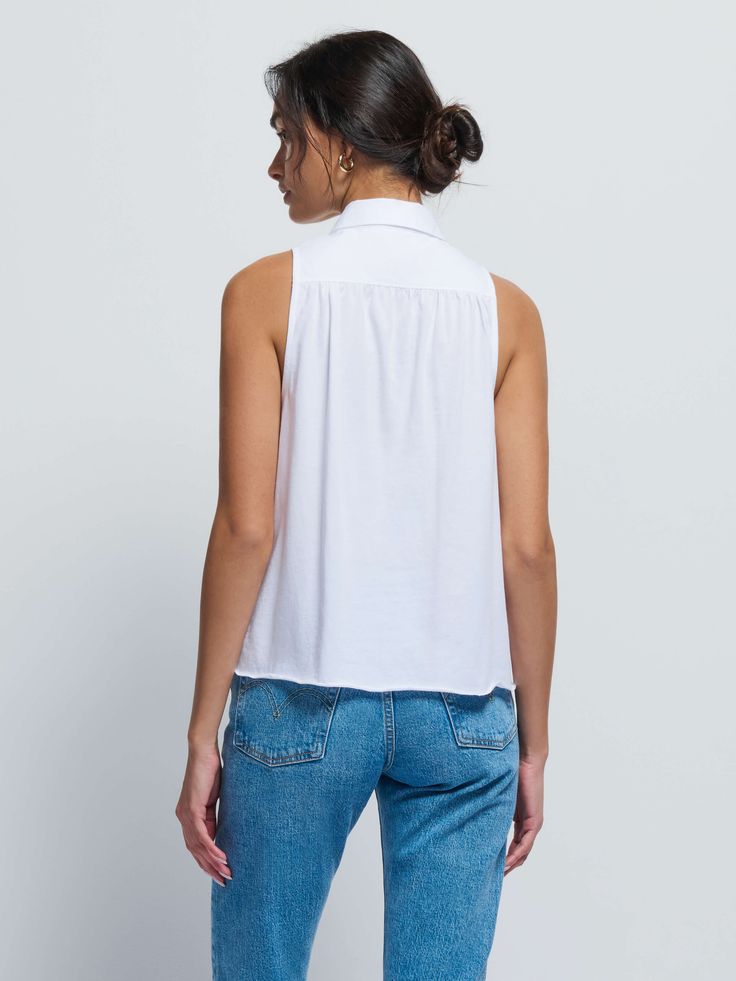 The collared contrast cotton poplin button front gives this classic tank the perfect sophisticated touch. Front and back yoke with forward shoulders and pintuck details for that feminine flair. (This one comes in White.) | Women's Greta Top in White | Ethical Essentials Cotton Tank Top With Button Closure For Work, Chic Cotton Top With Collared Neckline, Chic Cotton Tops With Collared Neckline, Classic Cotton Tank Top For Work, Classic Summer Tank Top For Daywear, Summer Collared Tank Top, Chic Cotton Button-up Tank Top, Classic Cotton Tank Top For Daywear, Chic Button-up Cotton Tank Top