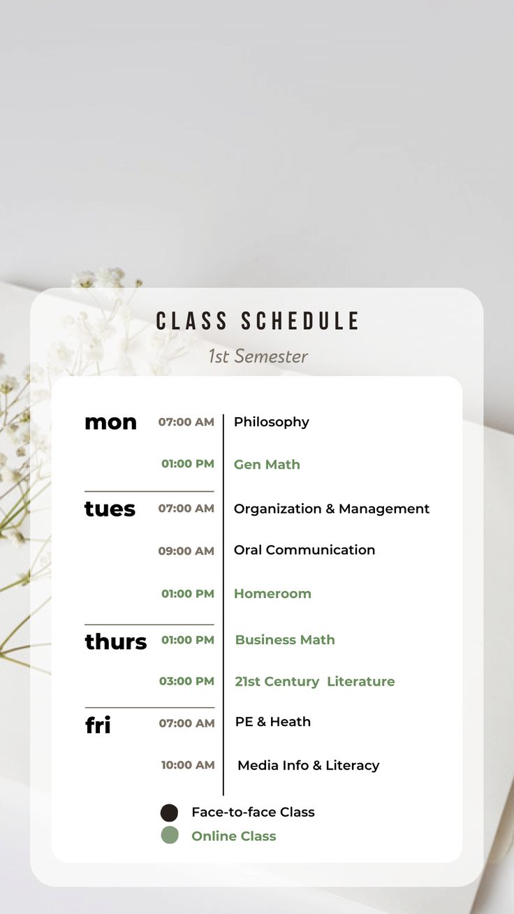 the class schedule is displayed on top of a white table with flowers and other items