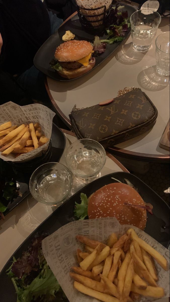 several trays filled with different types of food