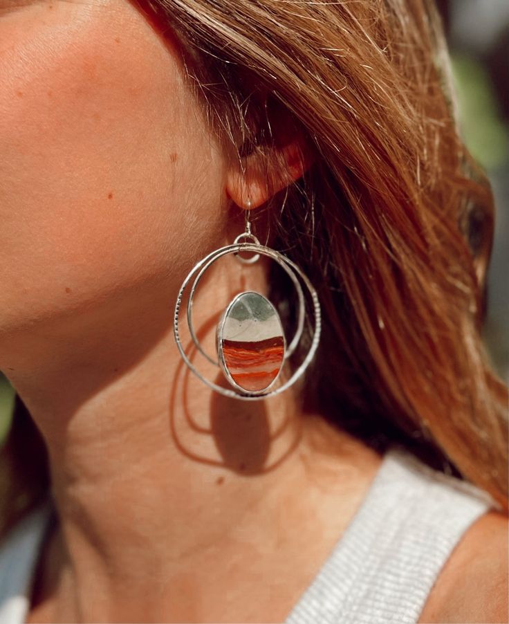 These Jasper hoops earrings feature beautiful, one-of-a-kind Polychrome Jasper stones set in sterling silver. Hand stamped and Completely hand crafted by yours truly. From start to finish I draw, plan and hand make each detail and my stones are sourced very high quality. •If you have any questions, please feel free to send me a message on Instagram @wildsoulgems or email me at wildsoulgems@gmail.com Handmade Earthy Silver Earrings, Earthy Sterling Silver Jewelry, Silver Sterling Silver Jewelry, Artisan Silver Jasper Jewelry, Earthy Sterling Silver Jewelry With Natural Stones, Nickel-free Round Earthy Jewelry, Nickel-free Earthy Round Jewelry, Bohemian Silver Jasper Jewelry, Nickel Free Earthy Silver Jewelry