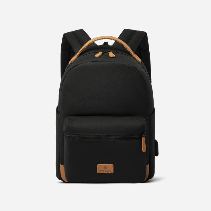 a black backpack with brown straps