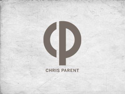 the logo for christ parent, which has been changed to be brown and white with black letters