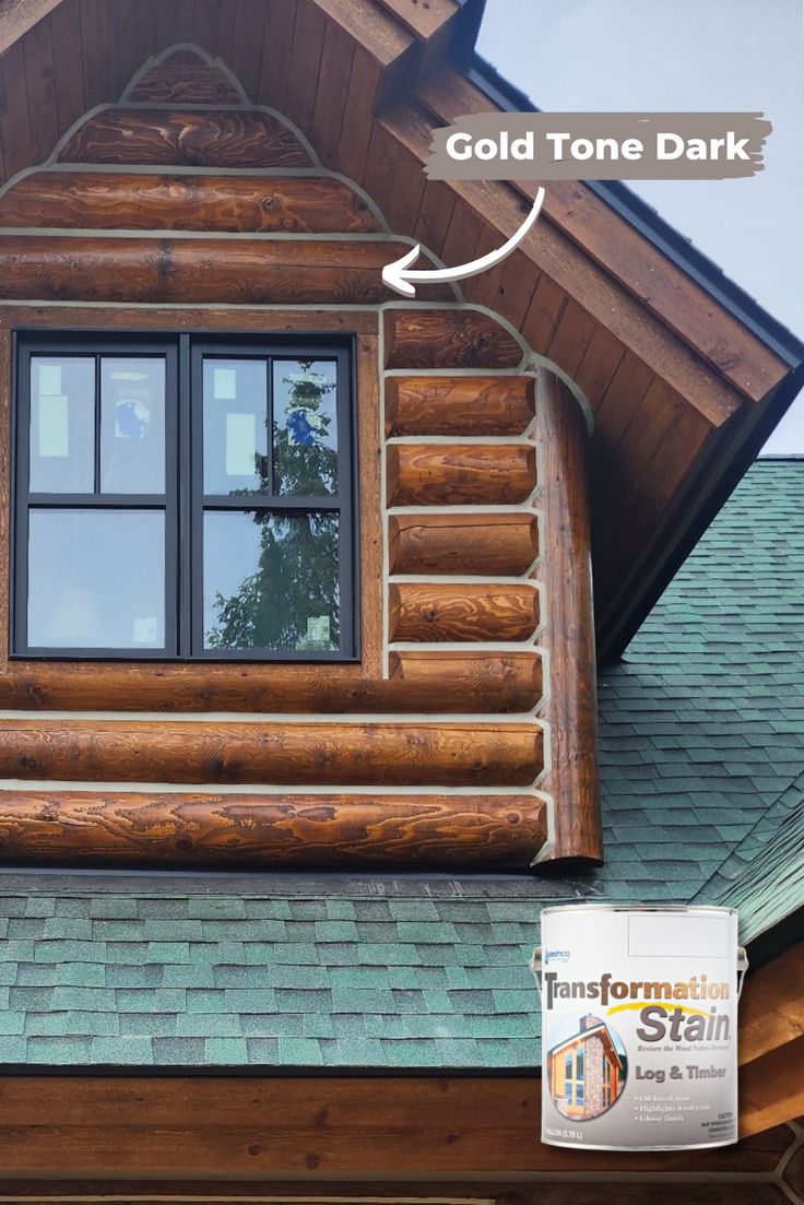 a close up of a window on the side of a wooden building with an arrow pointing to it