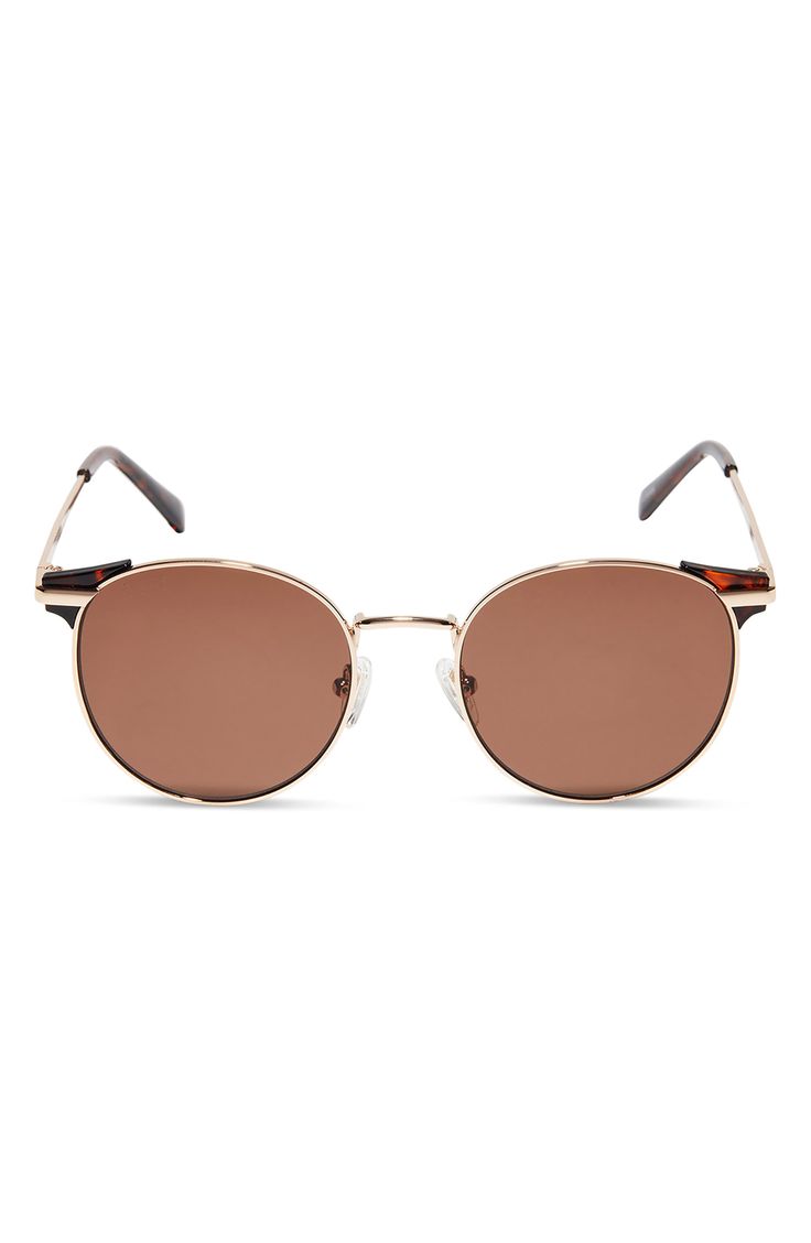 A rounded flare silhouette elevates the vintage-inspired appeal of these modern sunglasses set with tinted lenses. 53mm lens width; 19mm bridge width; 145mm temple length   100% UV protection   Stainless steel/CR-39   Imported   DIFF Eyewear participates in give-back initiatives that provide reading glasses to those in need Trendy Brown Round Frame Sunglasses, Casual Brown Round Sunglasses, Adjustable Round Frame Tinted Sunglasses, Brown Mirrored Cat Eye Sunglasses With Round Frame, Brown Round Frame Sunglasses With Tinted Lenses, Brown Sunglasses With Tinted Round Lenses, Retro Brown Adjustable Sunglasses, Brown Cat Eye Sunglasses With Tinted Round Frame, Casual Brown Sunglasses With Metal Frame