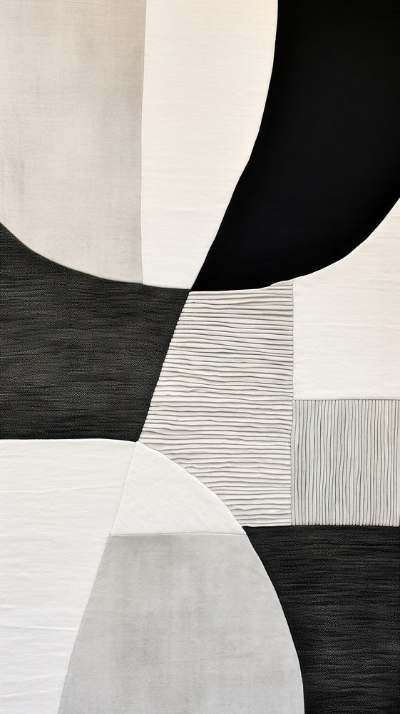 an abstract painting with black, white and grey colors