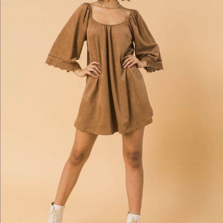 A Faux Suede Mini Dress Featuring Front/Back Square Neckline, 3/4 Bell Sleeve With Lace Edge And Relaxed Body. 90% Polyester 10% Spandex Care Instructions: Hand Wash Model Is 5'8" Wearing A Size Small Approx. Length 26" (Measurements Taken From A Size Small) Flowy Mini Dress For Fall, Stretch Dresses For Brunch In Fall, Stretch Dress For Fall Brunch, Fall Dresses With 3/4 Sleeves, Fall Date Night Dress With 3/4 Sleeve, Fall Dress For Date Night With 3/4 Sleeve, Spring Half-sleeve Stretch Mini Dress, Fall Flowy Half Sleeve Dresses, Flowy 3/4 Sleeve Dress For Fall