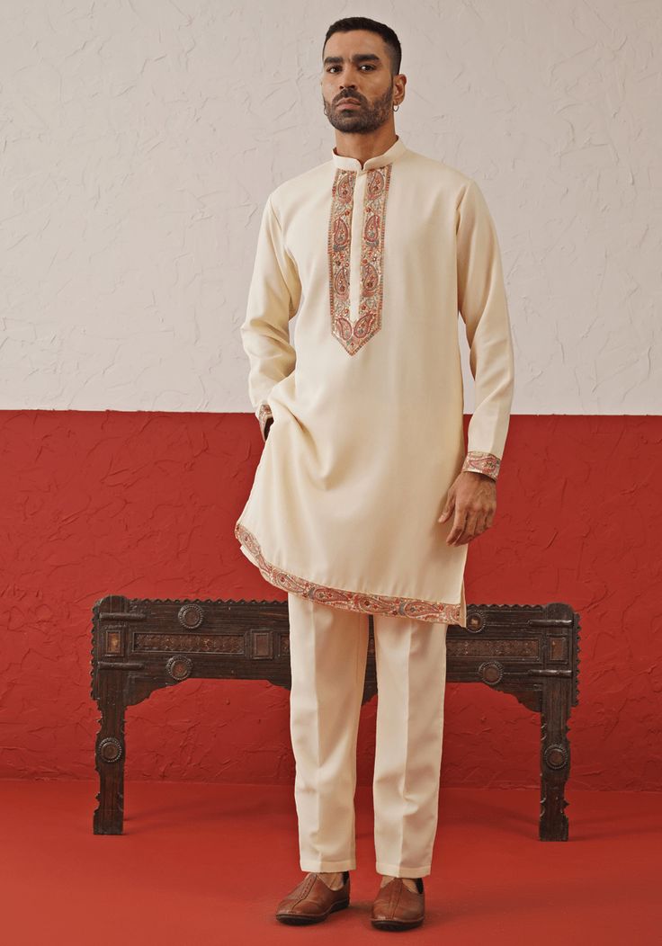 Elevate your ethnic charm with a stunning Cream Kurta. Crafted from georgette, the kurta features resham, zari, and sequinned embroidery, along with intricate detailing on the daman and cuffs. Paired with a matching pants, this ensemble radiates sophistication and elegance. Perfect for special occasions like Sangeet, Mehendi, Haldi, or as a wedding guest outfit. Composition : Kurta & Trouser : Viscose Georgette Care: Dry Clean Only and Vacuum Storage This product can be customized for sleeves, l Georgette Kurta, Vacuum Storage, Indian Wedding Wear, Matching Pants, Kurta Set, Guest Outfit, Wedding Wear, Wedding Guest Outfit, Indian Wedding