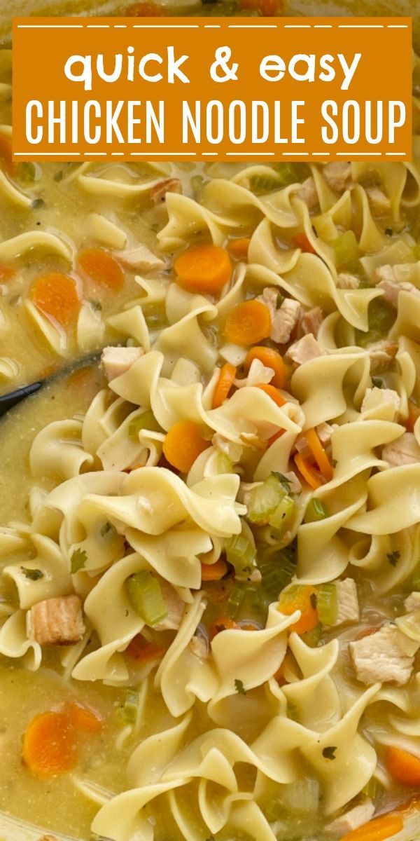 chicken noodle soup with carrots, celery and noodles in a bowl