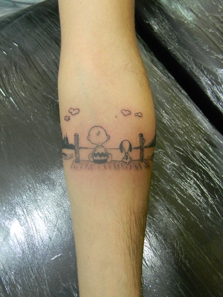 a person with a small tattoo on their leg