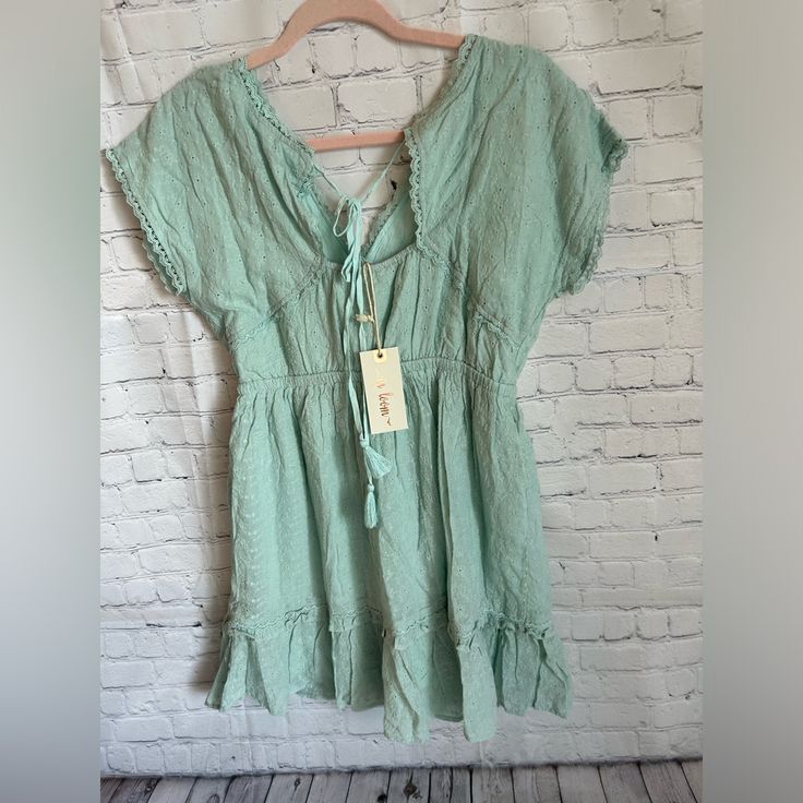 Nwt In Loom Eyelet Lace Trim Mini Dress Casual Boho Dress With Ruffle Hem For Spring, Casual Boho Dress With Ruffle Hem For Vacation, Casual Boho Short Sleeve Dress For Brunch, Casual Boho Dress With Short Sleeves For Brunch, Casual Boho Beach Dress With Ruffle Hem, Casual Boho Dress With Ruffle Hem For Beach, Casual Green Mini Boho Dress, Casual Cotton Boho Dress For Brunch, Plus Size Spring Dresses