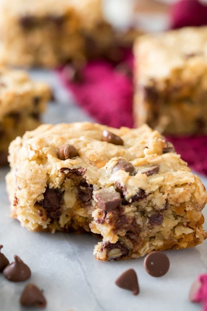 chocolate chip cookie bars cut in half and stacked on top of each other