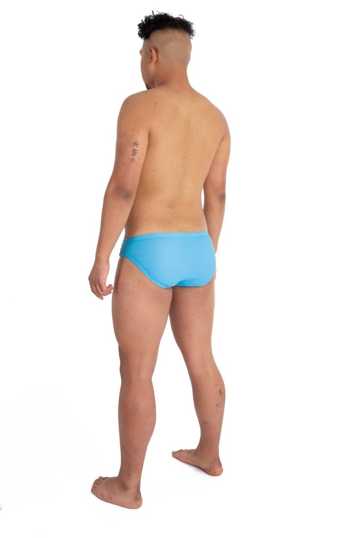 Whether it’s Bermuda, The Bahamas, or the Maldives, get into the sunny beach vibes with our sky blue swim briefs. In true Kapow fashion we’ve spiked ‘em with neon orange and a slash of leopard print to get all eyes on you. Featuring a classic cut and low-rise waist, they’ll take you from the ocean to the swim-up wet bar in tropical style. Description: Men’s Sky Blue Swim Briefs With Neon Orange And Leopard Print Highlight Panels Durable stretch fabric with a front liner for sports comfort and a Blue Functional Training Bottoms, Functional Blue Training Bottoms, Blue Sporty Activewear With Elastic Side Panels, Sweat Resistant Blue Sportswear Bottoms, Blue Sporty Sweat-resistant Bottoms, Sporty Light Blue Sports Bottoms, Sporty Blue Activewear With Elastic Side Panels, Sweat-resistant Blue Sportswear Bottoms, Sporty Blue Sweat-resistant Bottoms