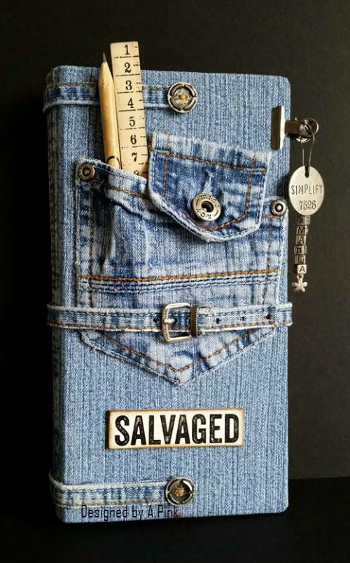 a denim pocket with a ruler and pencil in it that says salvaged on the side