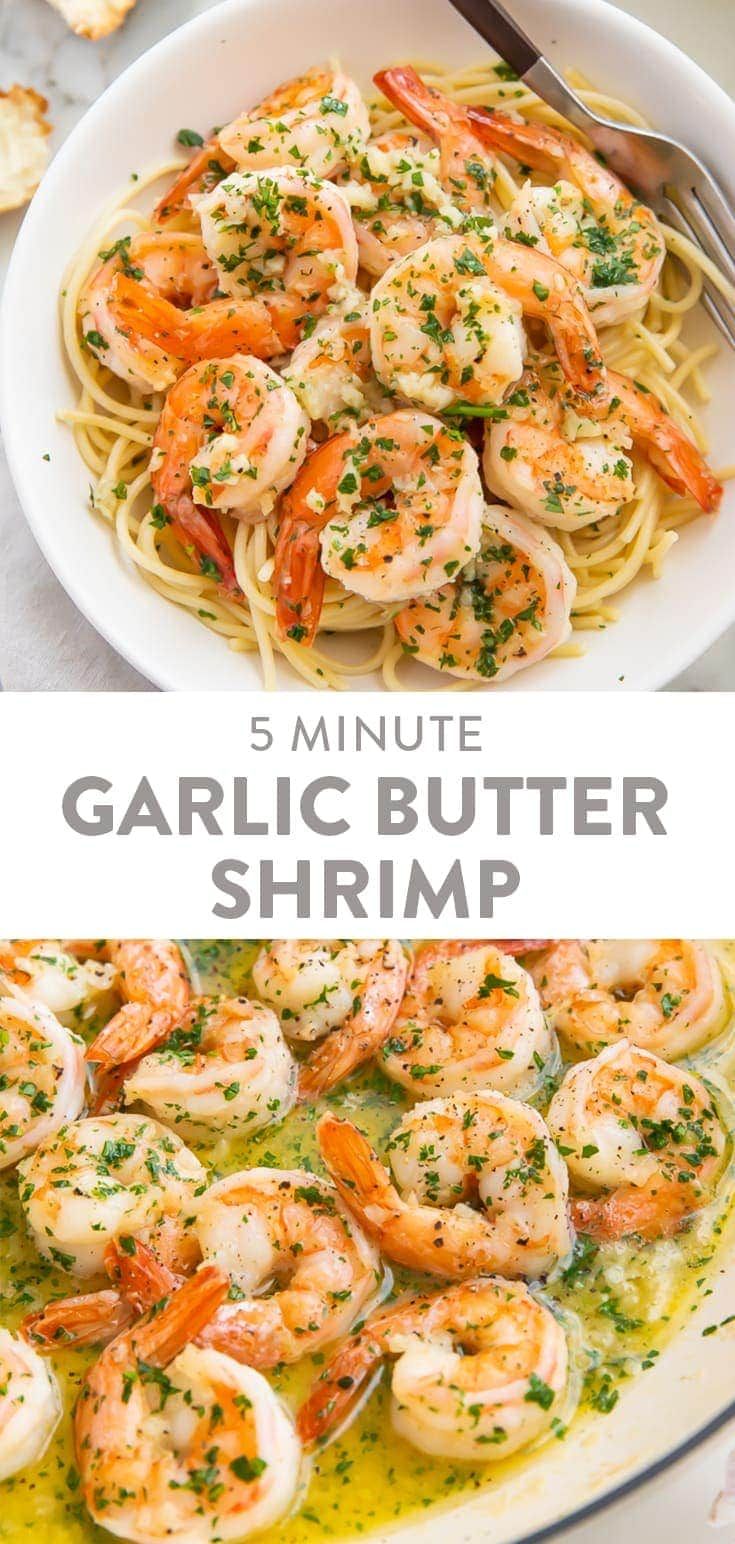 garlic butter shrimp is served over pasta in a white bowl