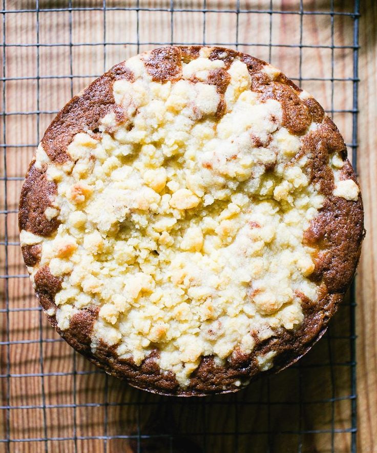 a cake sitting on top of a cooling rack