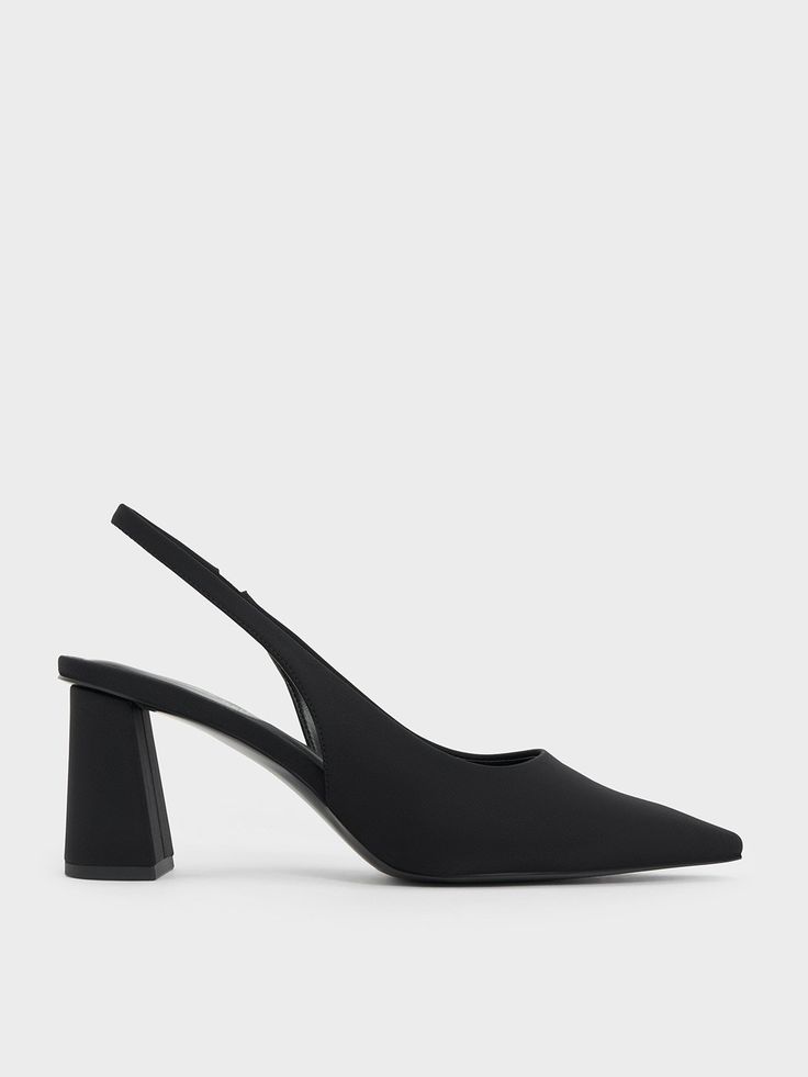 These black pumps will easily slot into your everyday rotation. Plus, they feature an elegant pointed toe that elongates your frame and creates a sharp silhouette, making them look just as luxurious as they feel. Set on trapeze block heels, they strike the balance between form and function. Plus points for the lightly elasticated slingback straps that guarantee a snug fit. Faux Leather Heels, Size Chart For Kids, White Pumps, Charles Keith, Orange Bag, The Balance, Slingback Pump, Handbag Shoes, Black Pumps