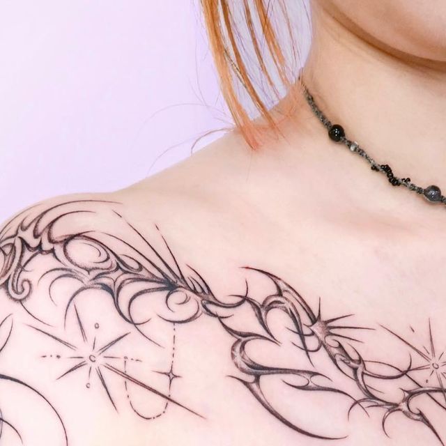 a woman with a tattoo on her chest