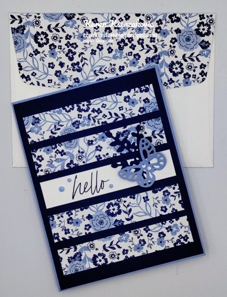 two cards with blue and white designs on them