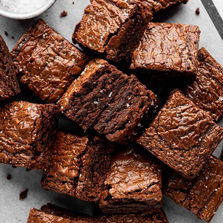 brownies cut into squares and sitting on a plate