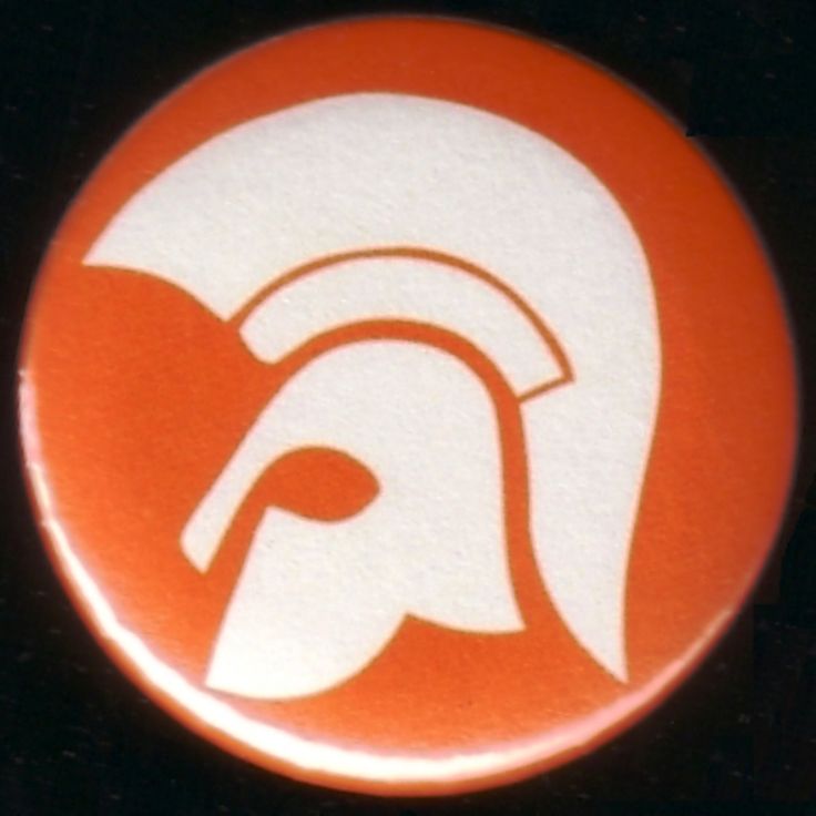 an orange and white button with a spartan helmet on it