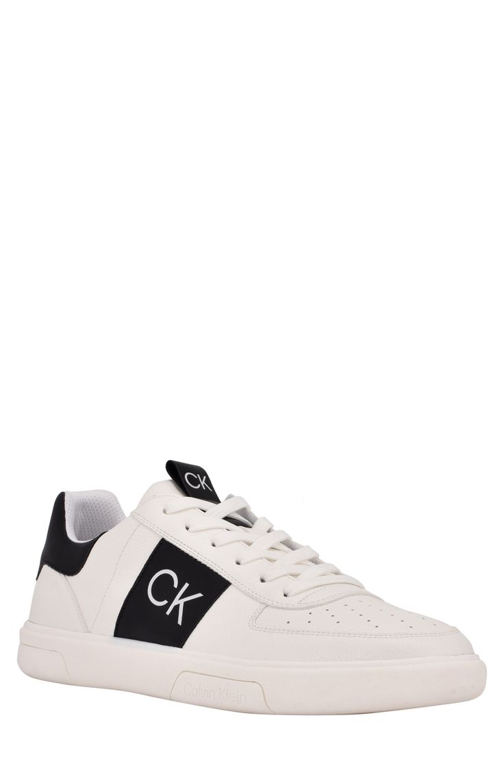 A logo heel adds brand-signature style to a low-top sneaker built with foam cushioning and arch support for all-day comfort. Synthetic upper, lining and sole Imported Modern Low-top Sneakers With Logo Print, Low-top Sports Sneakers With Embossed Logo, Classic Sneakers With Logo And Round Toe, Classic Sneakers With Logo, Sports Sneakers With Embossed Logo And White Sole, Sporty Sneakers With Embossed Logo And Round Toe, Classic High-top Logo Sneakers, Classic Logo High-top Sneakers, Sporty Sneakers With Embossed Logo And White Sole