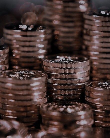 a pile of coins sitting next to each other