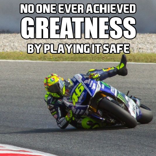 a man riding a motorcycle on top of a race track with the words, no one ever achieved greatness by playing it safe