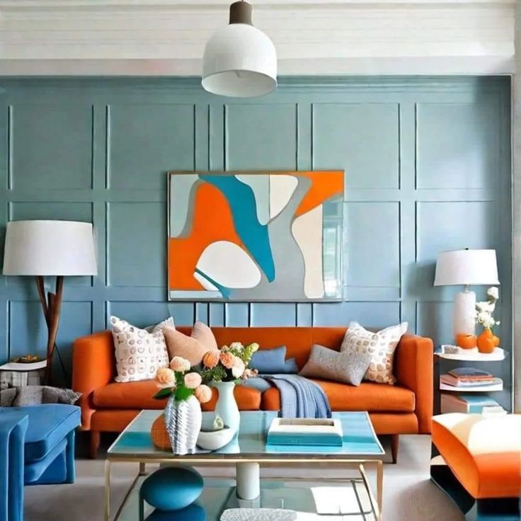 a living room with orange and blue furniture