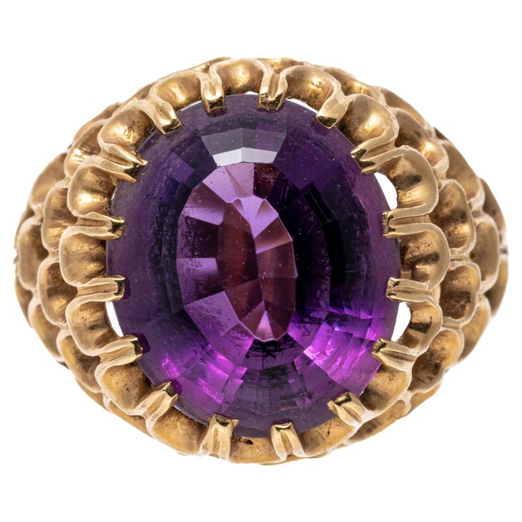 14k yellow gold ring. This wonderful ring has an oval faceted, medium to dark purple color amethyst, approximately 6.84 CTS and set into a wide, concentric open scalloped motif mounting. Marks: 14k Dimensions: 7/16" across the top x 9/16" long Weight: 5.7 gross dwt Amethyst Cocktail Ring, Amethyst Ring Vintage, Amethyst Set, Vintage Cocktail Ring, Green Amethyst Ring, Cocktail Jewelry, Ring Crafts, Lorde, Royal Purple