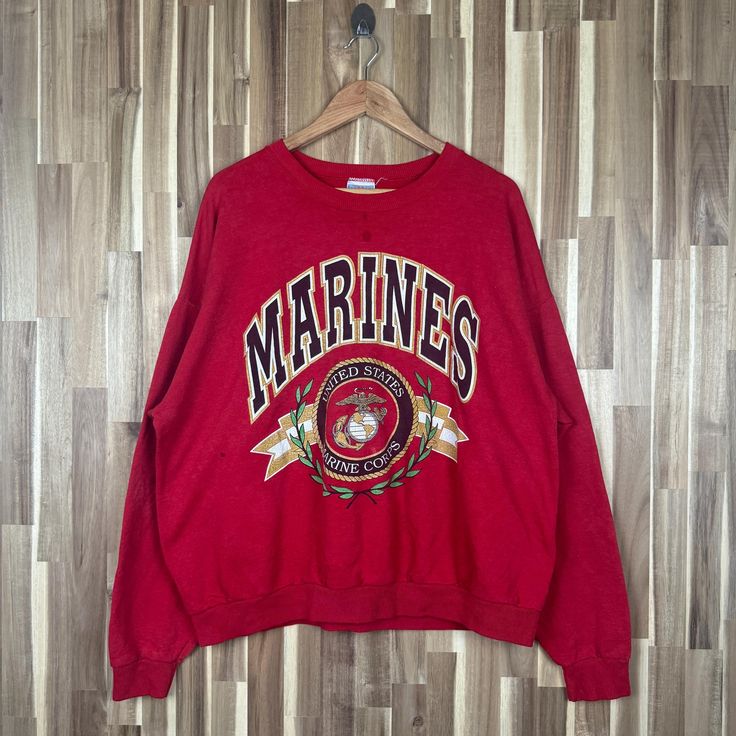 Vintage 90s Marines USMC Marine Corps Sweatshirt Crewneck United State Marine Corps Sweater Pullover Military USMC Print Logo Red Size XL  *50% Cotton. *50% Polyester *Jerzees Tag *Made in Mexico *Tag reads:  Size : XL (check measurements below) *Manual size measurement  Width :27" inches (armpit to armpit)                         Length : 26.5" inches  Boxy Fits All measurements are taken with the garment flat on the ground. *Condition: Good Conditions  Got a little stain (Refer Picture) good v Vintage Red Crew Neck Sweater, Red Vintage Crew Sweater, Red Oversized 90s Tops, Oversized 90s Red Top, Vintage Red Crew Sweatshirt, Red Vintage Crew Sweatshirt, Vintage Red Crew Neck Tops, 90s Style Red Sweatshirt With Letter Print, 90s Style Red Letter Print Sweatshirt