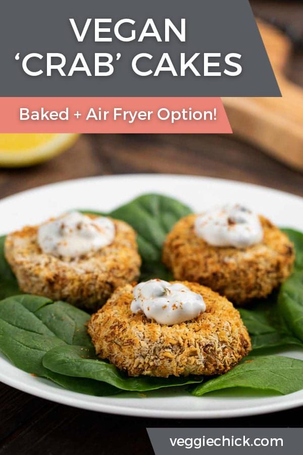 vegan crab cakes on a plate with spinach leaves