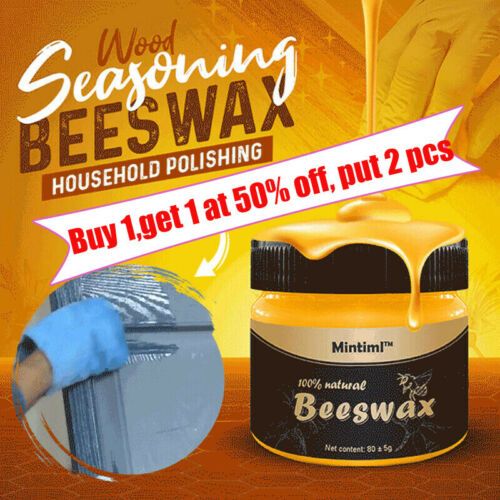 an advertisement for beeswax is shown with the image of a person holding a paint roller