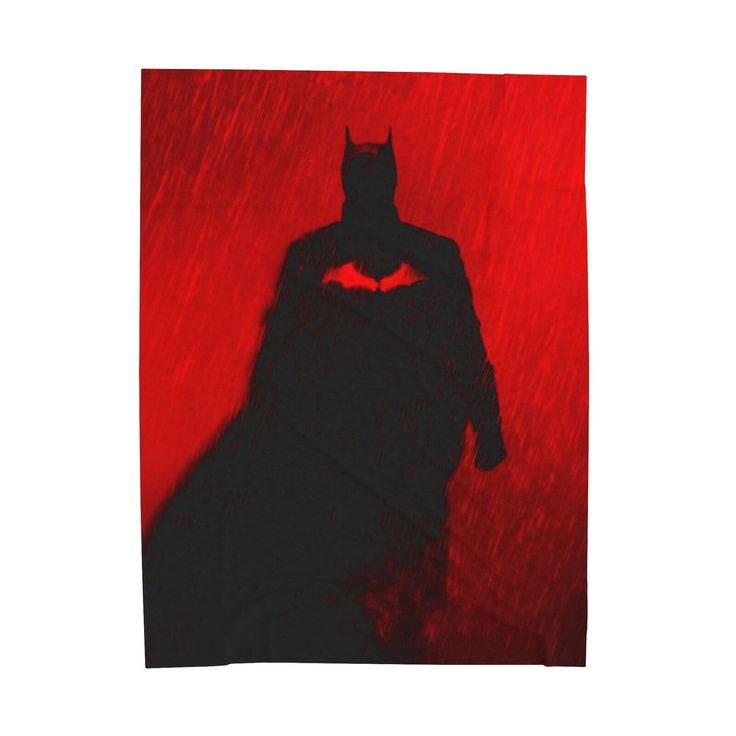 the shadow of a man in a batman costume on a red and black background is shown