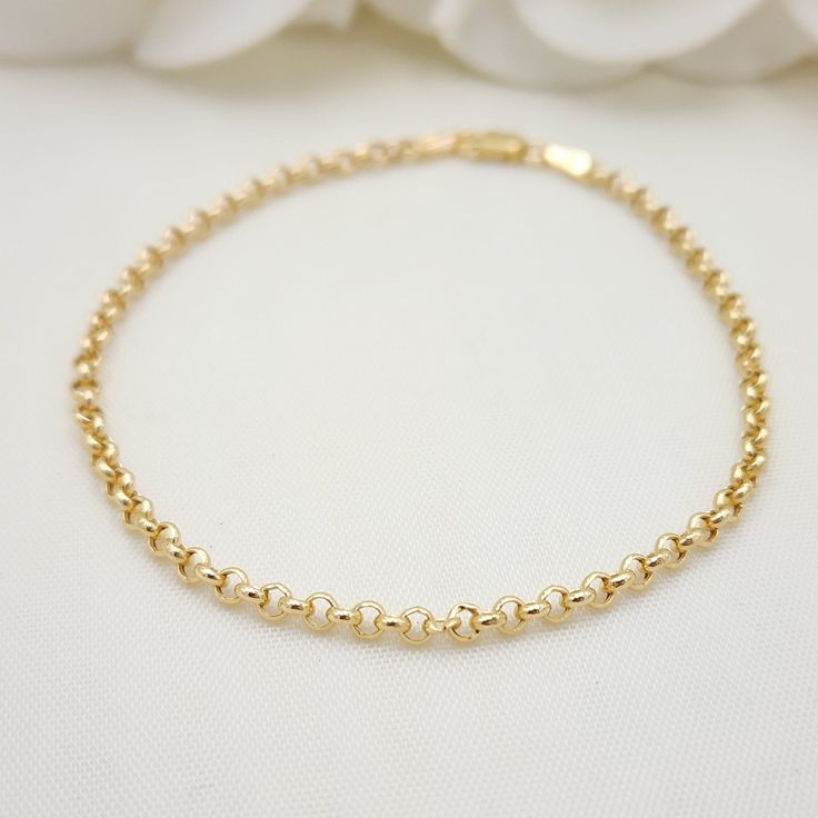 Beautiful real 14k Gold Rolo Bracelet. Perfect for everyday and every ocassion. Modern, versatile and everlasting. 14k gold will not tarnish or rust. Great gift idea. Materials: 14k Gold Lenght: 7.5 Inches Thickness: 3mm Weight: 1.6 grams (Hollow) 14k stamped Brand new Fast shipping Briza Collections is a small family owned business that works hard on providing the best selection of Fine Solid Gold Jewelry for the best prices. Our Goal is to bring you happiness and satisfaction, for this reason Round Gold Bracelet With Solid Link For Anniversary, Round Gold Bracelet With Solid Link Construction For Anniversary, Round Gold Anniversary Bracelet With Solid Link, Anniversary Gold Bracelet With Solid Link, Hypoallergenic Yellow Gold Charm Bracelet, 14k Yellow Gold Bracelets With Rolo Chain, 14k Gold Rolo Chain Bracelet For Everyday, Elegant Gold Bracelets With Rolo Chain, 14k Gold Bracelet With Solid Link Construction