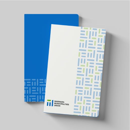 two blue and white brochures on top of each other, one with an abstract pattern