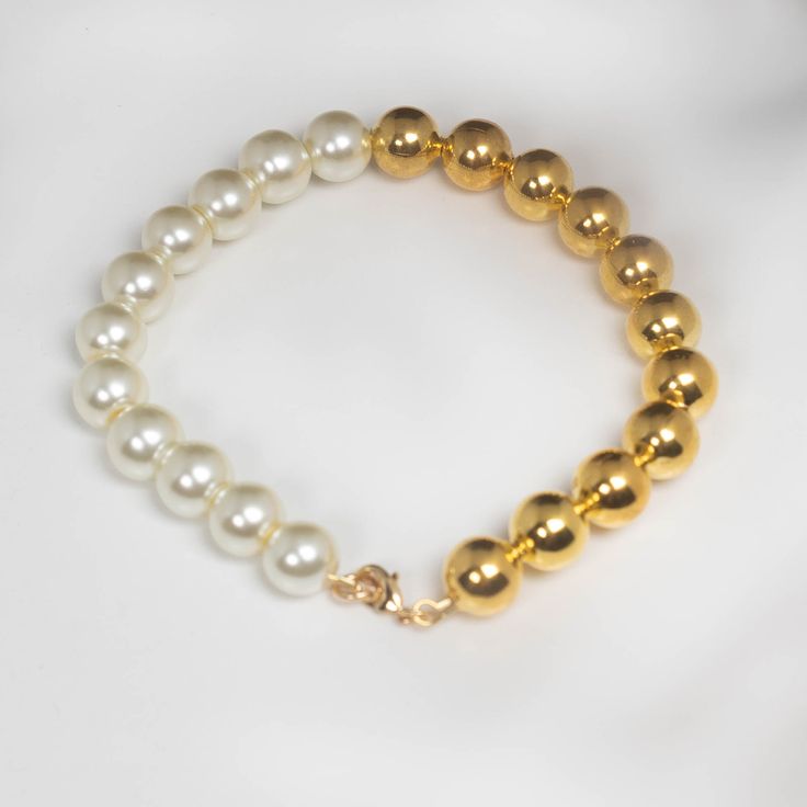 Gold plated bead and pearl bracelet 11 gold plated metal beads 11 glass white pearls Gold filled clasp 8 inches Gold Metal Pearl Bracelet For Party, Elegant Gold Rosary Bracelet With Spacer Beads, White Pearl Drop Bracelets For Party, White Metal Beaded Bracelets For Party, Adjustable Gold Metal Pearl Necklace, Pearl White Bracelets With 8mm Pearl Beads, Pearl Bracelet With Spacer Beads, Gold-tone Metal Jewelry With Round Beads, Gold Pearl Jewelry With 8mm Beads