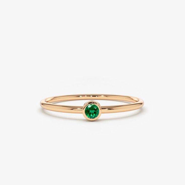 Item Details

Made to Order
Gold KT: 14k Solid Gold
Round Emerald: 2.5MM
 Number of Stones: 1
 Total CTW: 0.08ctw
 Width of Band: 1.20mm
 Setting Type: Bezel

 
 Description 
The dazzling solitaire emerald is set on a dainty solid gold ring band. Give your loved one a gift that’s perfect for her. Emerald Ring Simple Stone, Gold Ring Band, Solid Gold Band, Jewels Rings, Solid Gold Ring, Hot Jewelry, Local Jewelry, Gold Band Ring, Solid Gold Rings