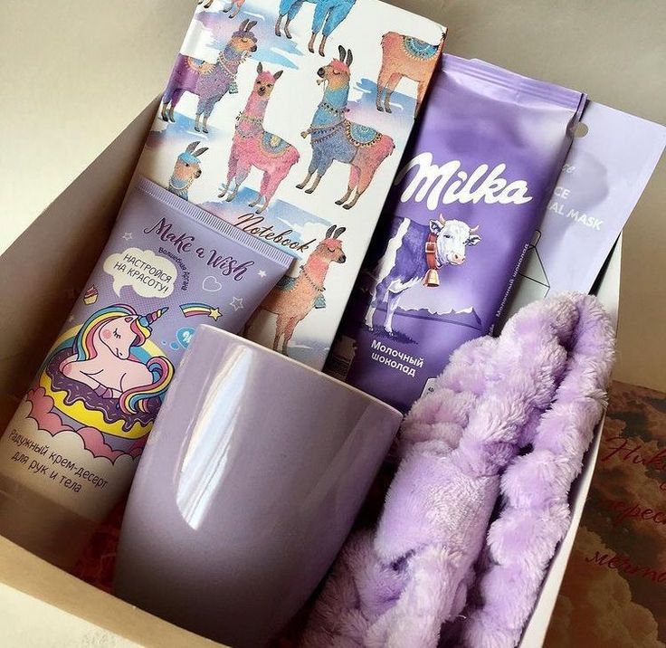 an open box containing various items including a cup, coffee mug and some other items