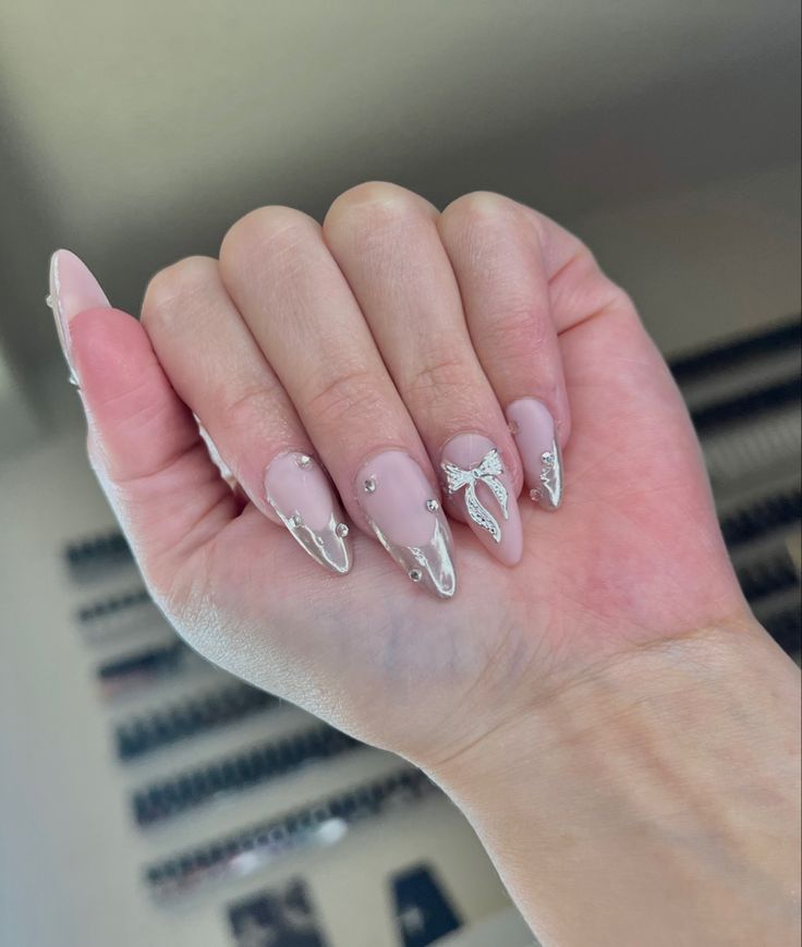 Silver Coquette Nails, Silver Valentine Nails, Chrome Nails With Bow, Silver Bow Nails, Chrome Bow Nails, Silver Chrome French Tip Nails, Buchifresa Nails, Silver Chrome French Tip, Nails For Wedding Guest