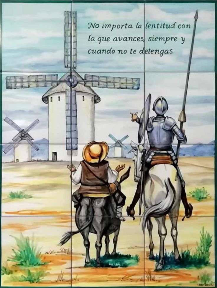 a tile mural depicting two knights on horseback with windmills in the background and spanish text