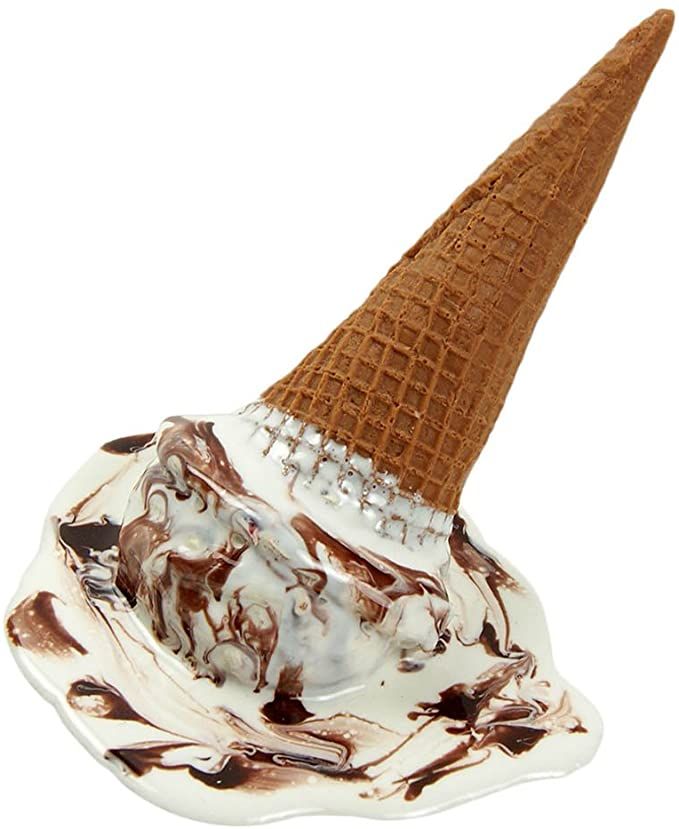 an ice cream cone with chocolate and white topping