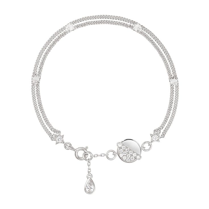 Crafted with precision, this sterling silver bracelet intertwines tradition with contemporary flair. Its double-chain design, anchored by twin crosses, exudes timeless sophistication. The central moon eclipse disk, adorned with radiant zirconia stones, mirrors a night sky ablaze with stars. The adjustable clasp, both functional and stylish, promises a bespoke fit for the discerning wearer. Meteorite Necklace, Wrist Accessories, Moon Eclipse, Meteorite Ring, Earring Jackets, Chain Design, Double Chain, The Night Sky, Macrame Bracelets