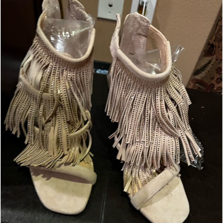 Very Cute Suede Fringed Booties With Gold Stones As Tasteful Bling Detail. Back Zipper Closure. 3 Layers Of Fringe. 4” Heel. Never Worn Excellent Condition Spring High Heel Shoes With Tassels, Spring High Heels With Tassels, Spring Fringe Open Toe Heels, Beige Suede Party Boots, Spring Party Beige Booties, Beige High Heel Booties For Party, Trendy Suede Party Booties, Beige Ankle Boot Heels For Evening, Chic Fringe Heels With Round Toe