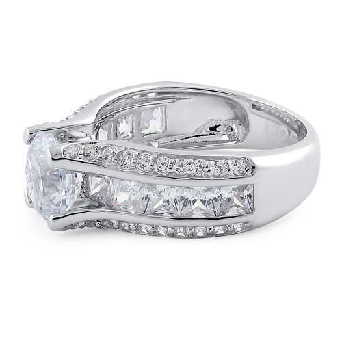 Top of ring height: 8mm

Top of ring width: 8.8mm

Band width: 7.5mm

Shank width: 4.7mm


Stone material: clear cubic zirconia

Center stone size: 8mm

Stone shape: round & princess cut

Center stone carat weight: 2.04 ct.

Total number of CZ stones: 51

Stone setting: prong setting


Metal: 925 sterling silver

Plating: rhodium plated

Finish: high polish Cubic Zirconia Promise Ring With Side Stones, Diamond White Cubic Zirconia Rings With Side Stones, Promise Rings With Side Stones In Cubic Zirconia, Cubic Zirconia Rings With Side Stones, Round Cut, Cubic Zirconia Rings With Side Stones, Cubic Zirconia Anniversary Ring With Side Stones, Cubic Zirconia Wedding Band With Accent Stones, Promise Ring With Side Stones, Promise Diamond Ring With Side Stones In Cubic Zirconia