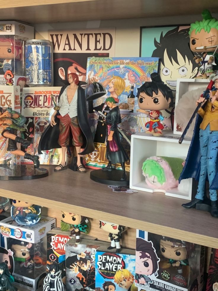 many anime figurines are on display in a toy store, including one male and one female