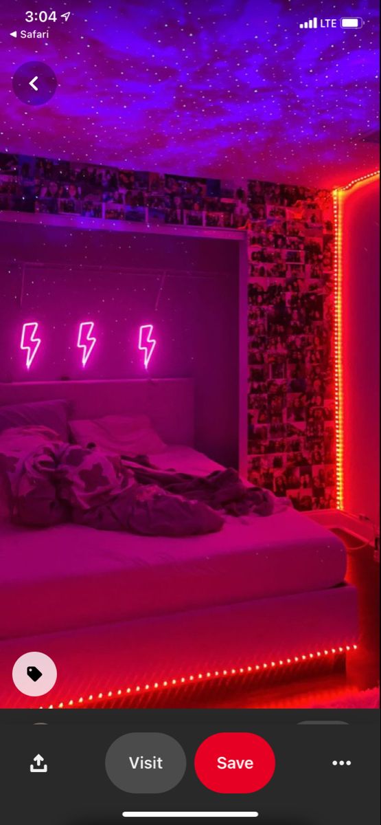 an image of a bed in the middle of a room with red lights on it